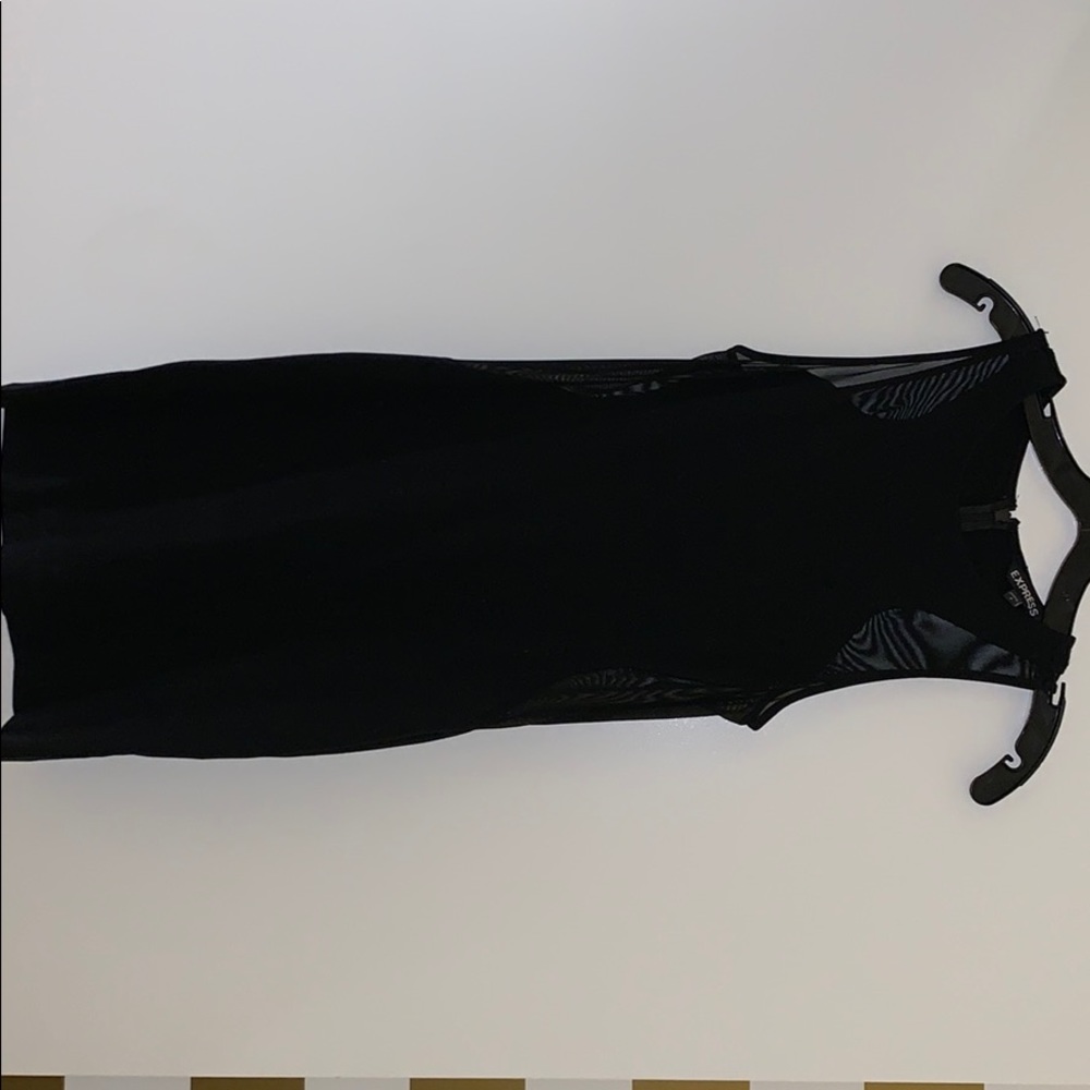 Black body con dress with see-through sides.